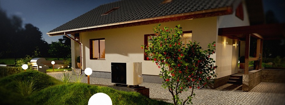 Ansicht eines Einfamilienhauses in früher Abendstimmung mit beleuchtetem Vorplatz und Wärmepumpe im Vordergrund